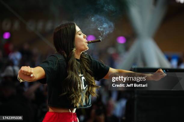 Kelsey Plum of the Las Vegas Aces celebrates during the 2023 WNBA championship victory parade and rally on the Las Vegas Strip on October 23, 2023 in...