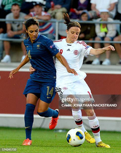 France's midfielder Louisa Necib and Denmark's defender Mia Brogaard vie for the ball during the UEFA Women's European Championship Euro 2013 quarter...