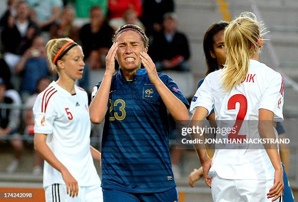 France's midfielder Camille Abily reacts during the UEFA Women's European Championship Euro 2013 quarter final football match France vs Denmark on...