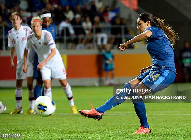 France's midfielder Louisa Necib shoots a penalty to score during the UEFA Women's European Championship Euro 2013 quarter final football match...