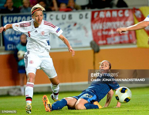 France's midfielder Camille Abily and Denmark's defender Janni Arnth vie for the ball during the UEFA Women's European Championship Euro 2013 quarter...