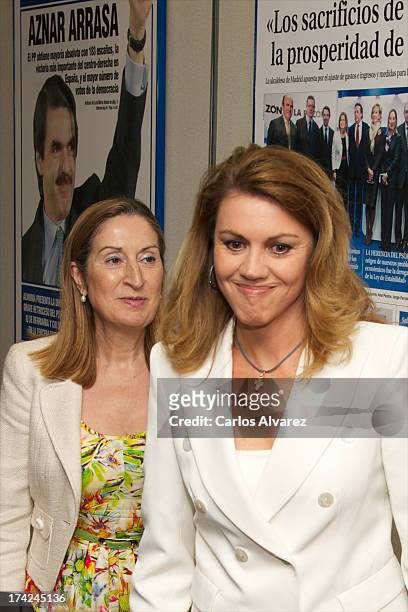 S General Secretary Maria Dolores de Cospedal and Spain's Minister of Development Ana Pastor attend the "La Razon" newspaper meeting on July 22, 2013...