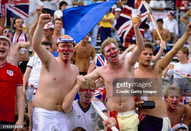 England fans with St Georges' flags painted on their faces during a 1986 FIFA World Cup group match against Portugal on June 3rd, 1986 in Monterrey,...