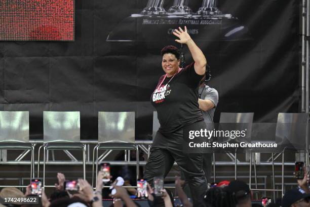 General manager Natalie Williams of the Las Vegas Aces waves as she is introduced during the 2023 WNBA championship victory parade and rally on the...