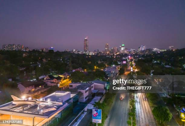 sandton city skyline with the mirage iii jet - sandton cbd stock pictures, royalty-free photos & images