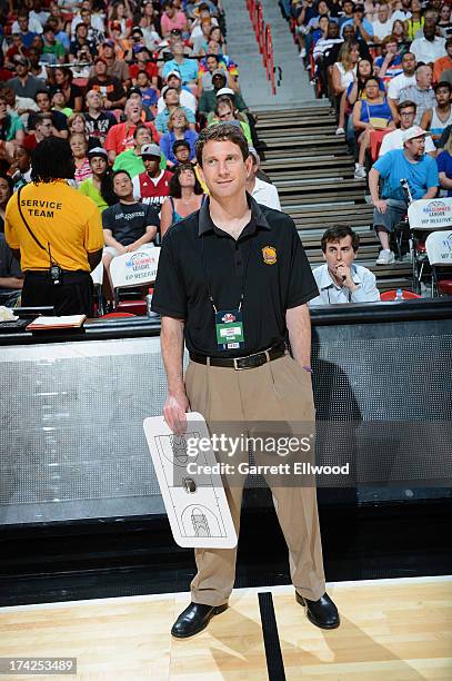 Head Coach Darren Erman of the Golden State Warriors looks on against the Phoenix Suns during NBA Summer League Championship Game on July 22, 2013 at...