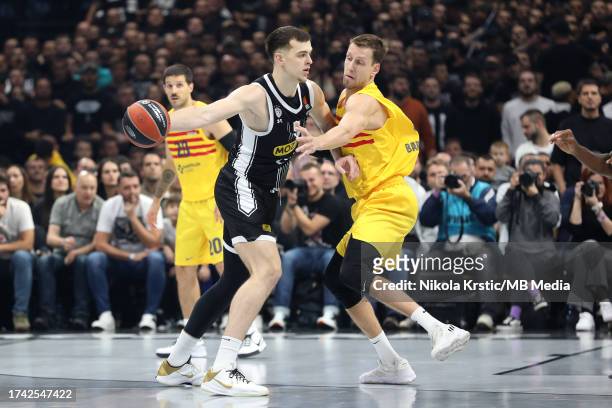 Balsa Koprivica of Partizan Mozzart Bet Belgrade competes against Jan Vesely of FC Barcelona during the 2023/2024 Turkish Airlines EuroLeague match...