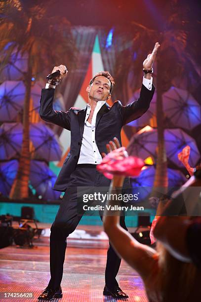 Marc Anthony performs onstage during the Premios Juventud 2013 at Bank United Center on July 18, 2013 in Miami, Florida.