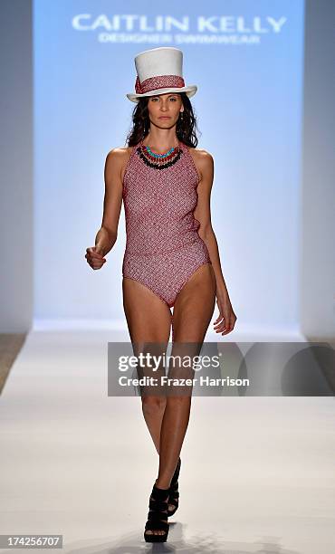 Model walks the runway at the Caitlin Kelly Swimwear show at Cabana Grande at the Raleigh on July 22, 2013 in Miami, Florida.