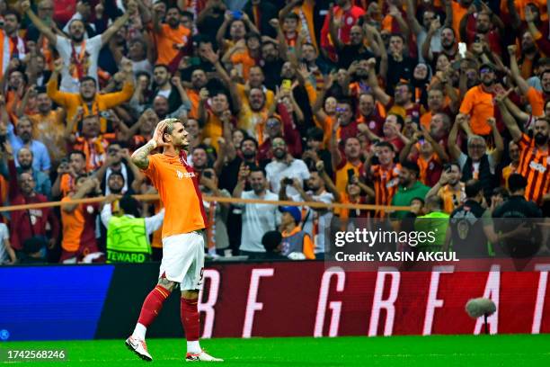 Galatasaray's Argentine forward Mauro Icardi celebrates after scoring a goal during the UEFA Champions League group stage football match between...