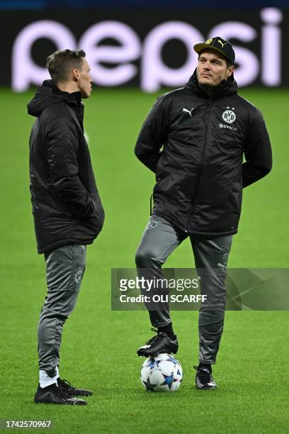 Dortmund's German coach Edin Terzic attends a training session at St James' Park, northeast England, on October 24, 2023 on the eve of their UEFA...