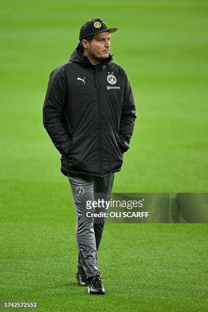 Dortmund's German coach Edin Terzic attends a training session at St James' Park, northeast England, on October 24, 2023 on the eve of their UEFA...