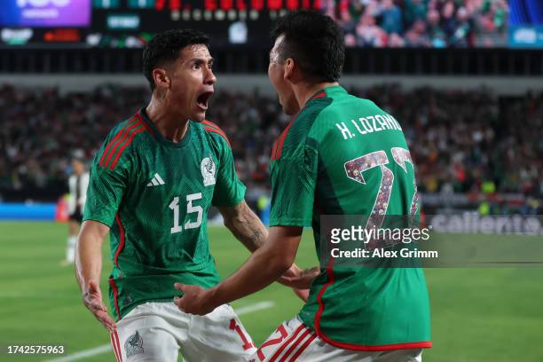Carlos Antuna of Mexico celebrates the team's first goal with teammate Hirving Lozano during the international friendly between Germany and Mexico at...