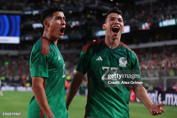 Carlos Antuna of Mexico celebrates the team's first goal with teammate Hirving Lozano during the international friendly between Germany and Mexico at...