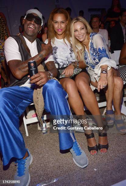 Dennis Rodman, Alexis Rodman, and Lisa Pliner attend Anna Kosturova/Beach Riot/Lolli Swim/Manglar/Indah show at Mercedes-Benz Fashion Week Swim 2014...