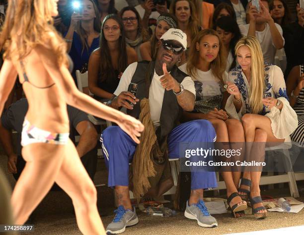 Dennis Rodman, Alexis Rodman, and Lisa Pliner attends Anna Kosturova/Beach Riot/Lolli Swim/Manglar/Indah show at Mercedes-Benz Fashion Week Swim 2014...