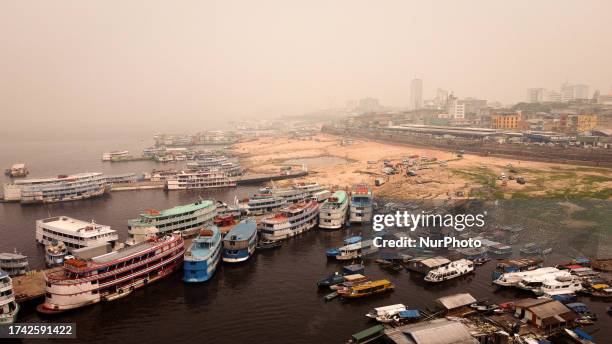 Manaus, 12th Oct 2023 - Manaus wakes up shrouded in smoke, experiencing the second worst air quality in the world, surpassing highly urbanized cities...