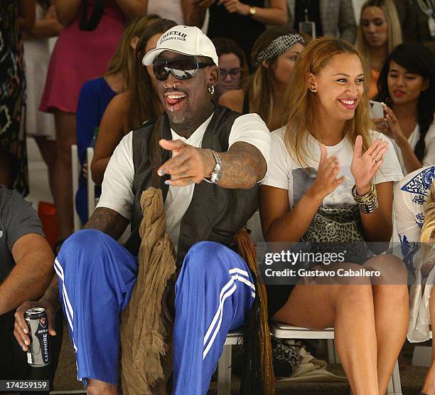 Dennis Rodman and Alexis Rodman attend Anna Kosturova/Beach Riot/Lolli Swim/Manglar/Indah show at Mercedes-Benz Fashion Week Swim 2014 at Cabana...