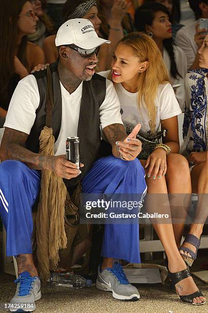 Dennis Rodman and Alexis Rodman attend Anna Kosturova/Beach Riot/Lolli Swim/Manglar/Indah show at Mercedes-Benz Fashion Week Swim 2014 at Cabana...