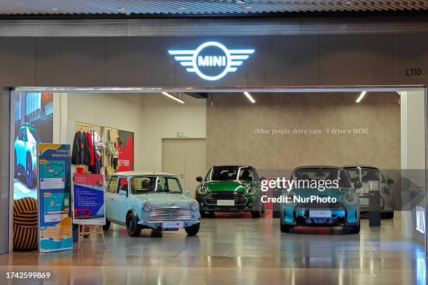 Cars are displayed at the BMW MINI store at GALA MALL in Shanghai, China, October 24, 2023.