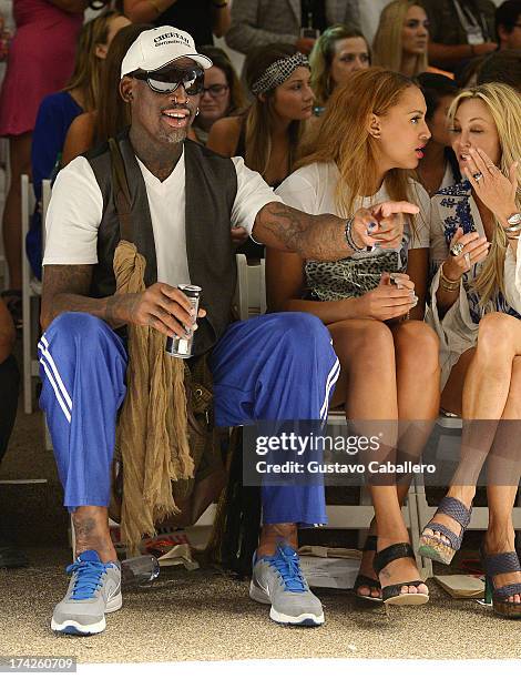 Dennis Rodman, Alexis Rodman, and Lisa Pliner attend Anna Kosturova/Beach Riot/Lolli Swim/Manglar/Indah show at Mercedes-Benz Fashion Week Swim 2014...