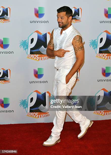 Ricky Martin poses in the press room during the Premios Juventud 2013 at Bank United Center on July 18, 2013 in Miami, Florida.