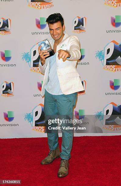 Jencarlos Canela poses in the press room during the Premios Juventud 2013 at Bank United Center on July 18, 2013 in Miami, Florida.