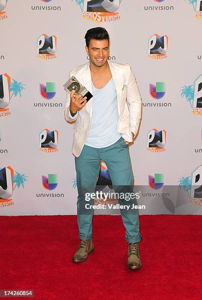 Jencarlos Canela poses in the press room during the Premios Juventud 2013 at Bank United Center on July 18, 2013 in Miami, Florida.