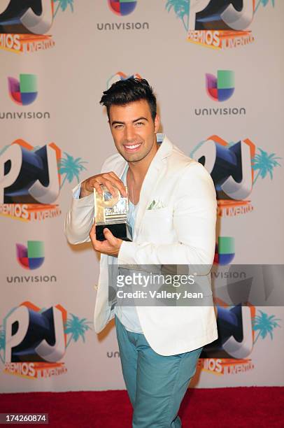 Jencarlos Canela poses in the press room during the Premios Juventud 2013 at Bank United Center on July 18, 2013 in Miami, Florida.