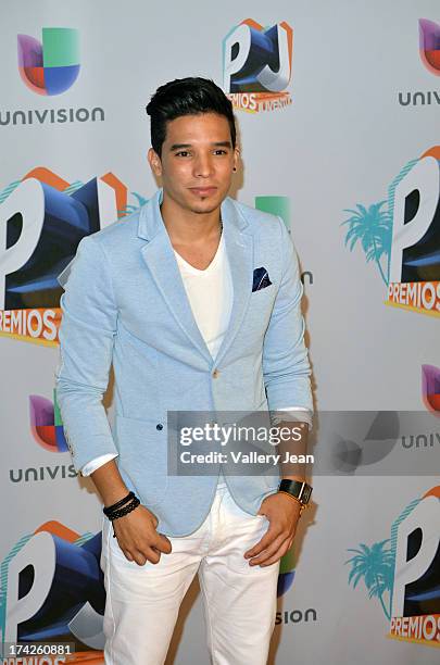 Christian Pagan poses in the press room during the Premios Juventud 2013 at Bank United Center on July 18, 2013 in Miami, Florida.