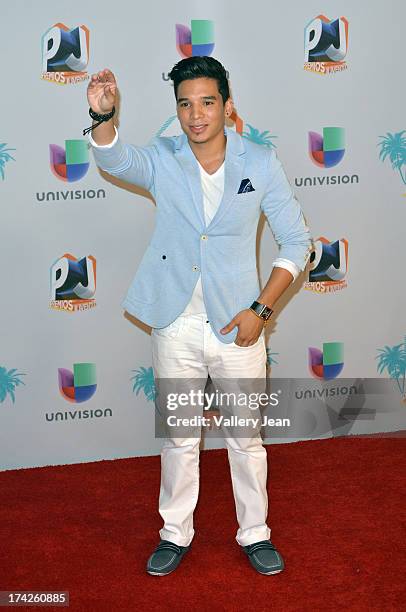 Christian Pagan poses in the press room during the Premios Juventud 2013 at Bank United Center on July 18, 2013 in Miami, Florida.