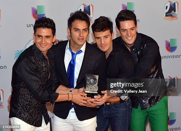 Marconi pose in the press room during the Premios Juventud 2013 at Bank United Center on July 18, 2013 in Miami, Florida.