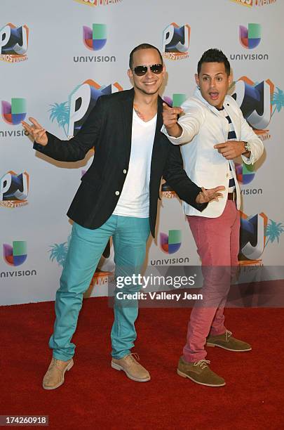 Khriz and Angel of Angel y Khriz pose in the press room during the Premios Juventud 2013 at Bank United Center on July 18, 2013 in Miami, Florida.