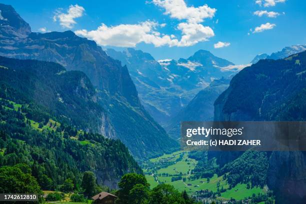 a summer view of the lauterbrunnen valley in the swiss alps - monch stock pictures, royalty-free photos & images