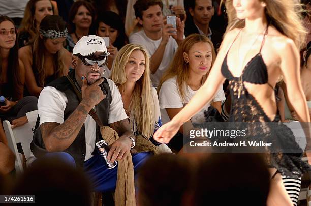 Dennis Rodman, Lisa Pliner and Alexis Rodman attend the Anna Kosturova/Beach Riot/Lolli Swim/Manglar/Indah show during Mercedes-Benz Fashion Week...