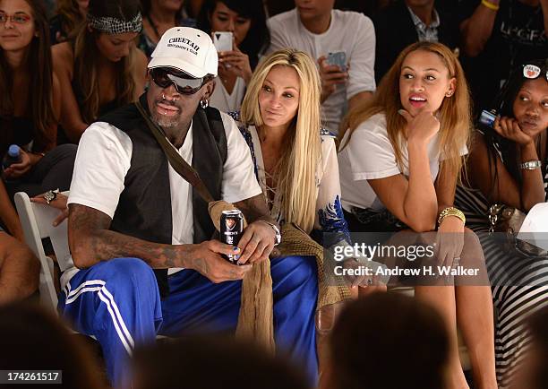 Dennis Rodman, Lisa Pliner and Alexis Rodman attend the Anna Kosturova/Beach Riot/Lolli Swim/Manglar/Indah show during Mercedes-Benz Fashion Week...