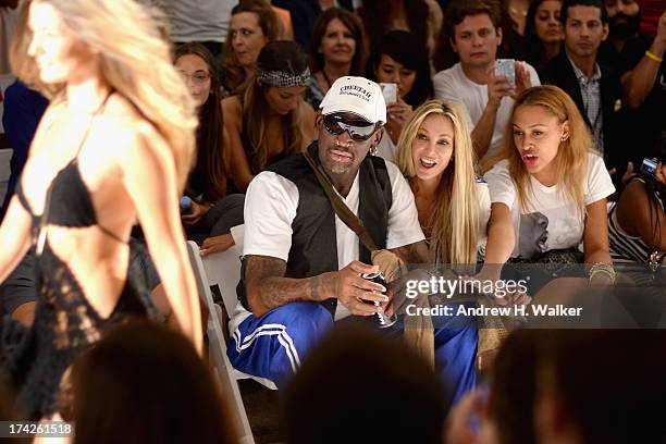 Dennis Rodman, Lisa Pliner and Alexis Rodman attend the Anna Kosturova/Beach Riot/Lolli Swim/Manglar/Indah show during Mercedes-Benz Fashion Week...