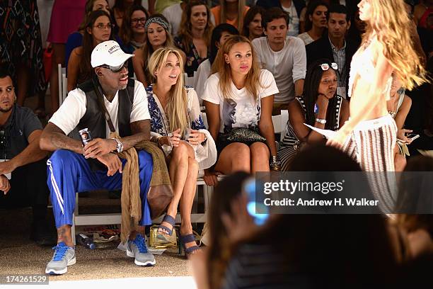 Dennis Rodman, Lisa Pliner and Alexis Rodman attend the Anna Kosturova/Beach Riot/Lolli Swim/Manglar/Indah show during Mercedes-Benz Fashion Week...