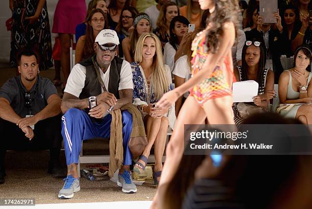 Dennis Rodman, Lisa Pliner and Alexis Rodman attend the Anna Kosturova/Beach Riot/Lolli Swim/Manglar/Indah show during Mercedes-Benz Fashion Week...