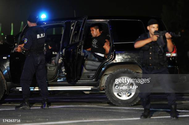 Members of the Algerian police forces take part in a show of force ceremony marking the fiftieth anniversary of the General Directorate of National...