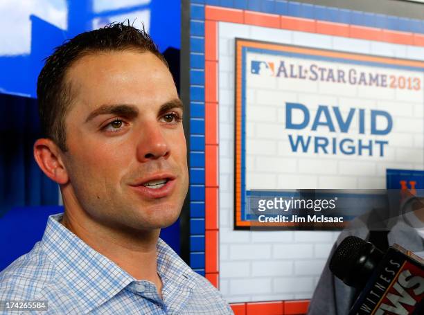 David Wright of the New York Mets answers questions during media availability prior to All-Star Workout Day on July 15, 2013 at Citi Field in the...
