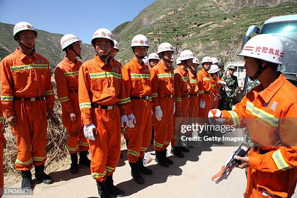 Rescuers head to quake-hit areas on July 22, 2013 in Minxian, China. At least 89 people were killed and 5 others missing after a 6.6-magnitude...
