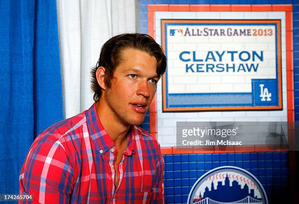Clayton Kershaw of the Los Angeles Dodgers answers questions during media availability prior to All-Star Workout Day on July 15, 2013 at Citi Field...