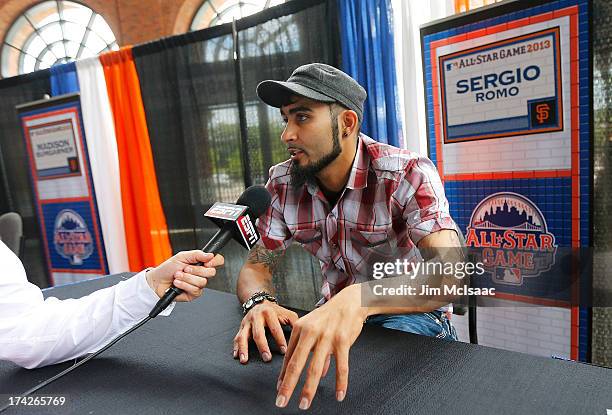 Sergio Romo of the San Francisco Giants answers questions during media availability prior to All-Star Workout Day on July 15, 2013 at Citi Field in...