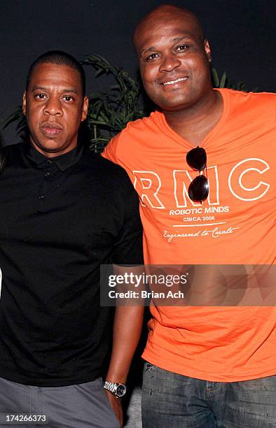 Rapper Jay Z and former NBA player Antoine Walker attend the Jay Z and D'USSE Cognac Host The Official Legends of the Summer After Party at Lumen on...