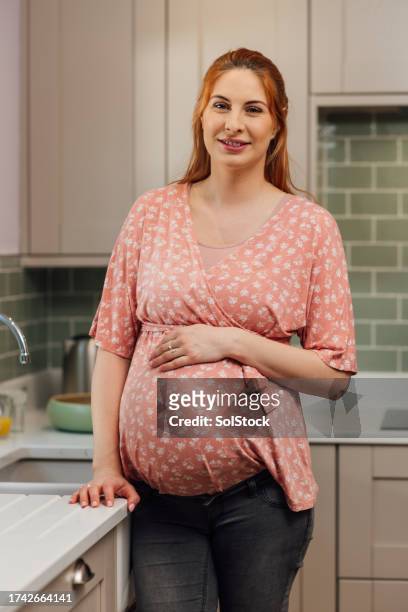 happy pregnant woman portrait - girlie room stock pictures, royalty-free photos & images