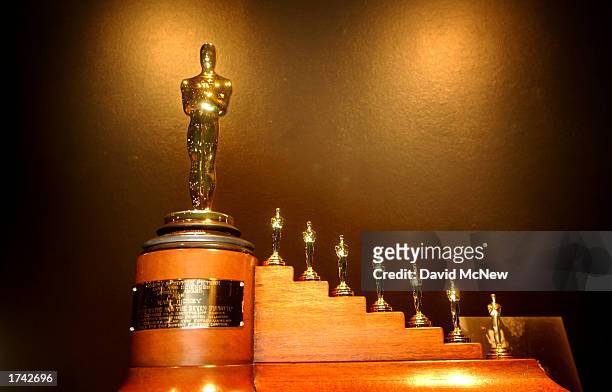 Special Oscar statuette that was awarded to Walt Disney in 1938 for "Snow White and the Seven Dwarfs" that shows an Oscar figure accompanied by seven...