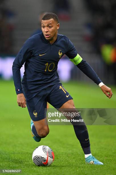 Kylian Mbappe of France in action during the International Friendly match between France and Scotland at Decathlon Arena on October 17, 2023 in...