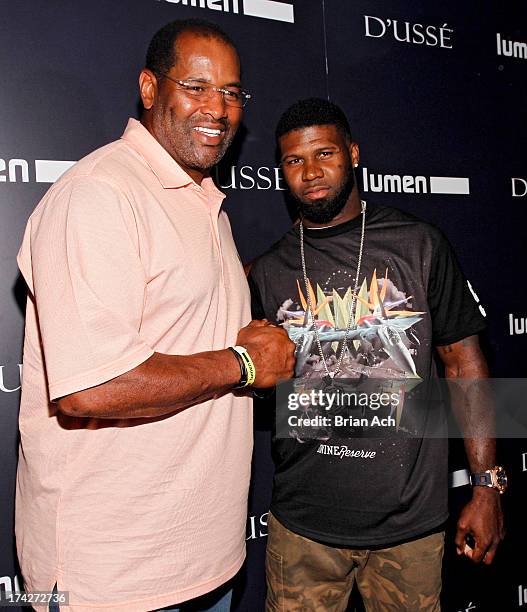 Former Chicago Bears player Richard Dent and current Chicago Bears player Devin Hester attend the JAY Z and D'USSE Cognac Host The Official Legends...