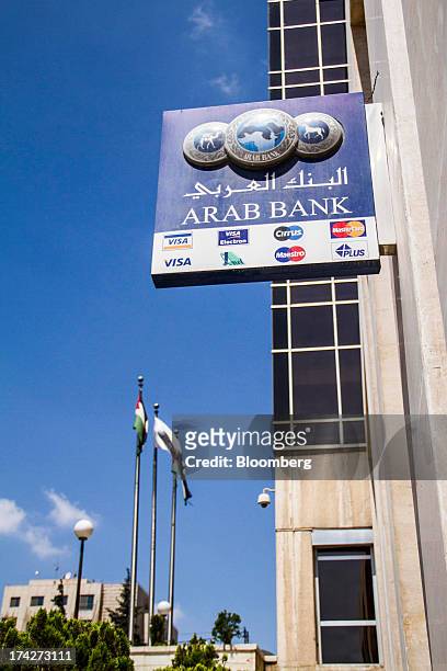 Sign sits on display outside the headquarters of Arab Bank Plc in the financial district in Amman, Jordan, on Sunday, July 21, 2013. Jordanian...